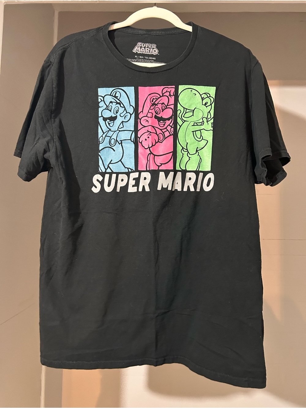 Nintendo Black Super Mario Graphic Tee with Blue Pink Green Panels